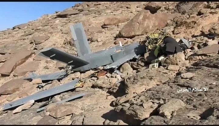 Crashed composite UAV in rocky terrain
