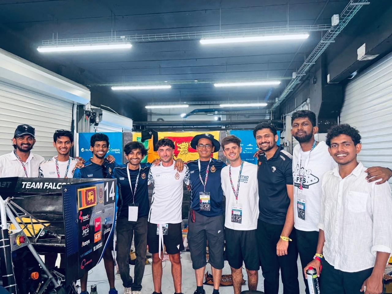 With other engineers at Pit lane
