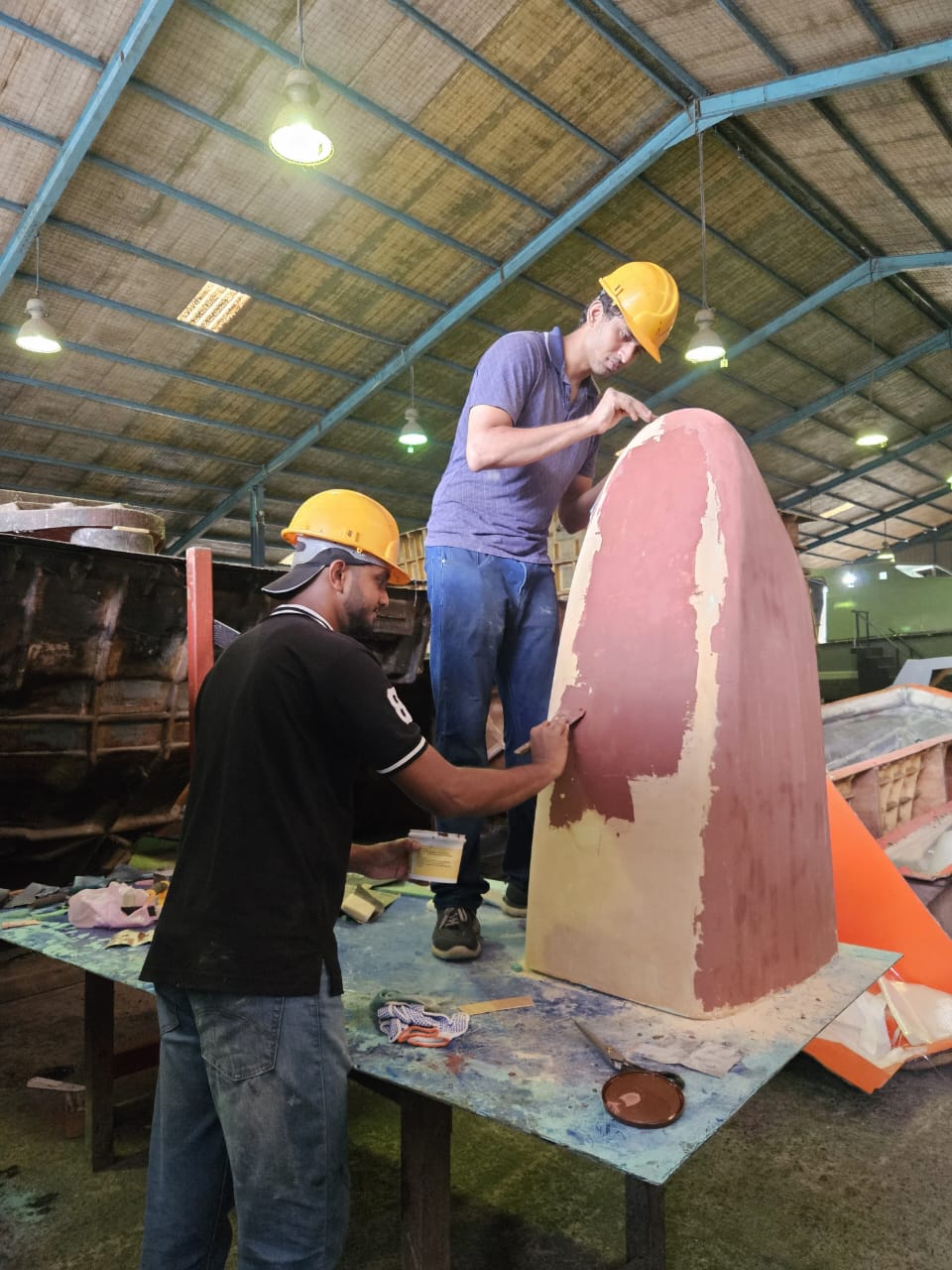 Applying wood putty to a machined polystyrene pattern